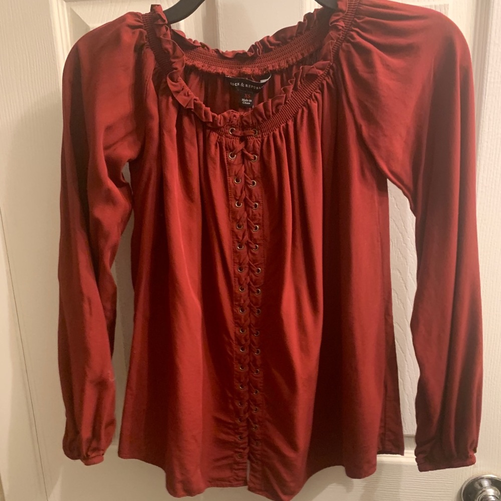 Can be worn at neckline or off the shoulder